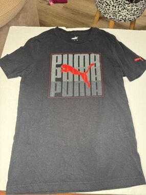Size Small men’s Puma Black Short Sleeve Tee with Red Logo